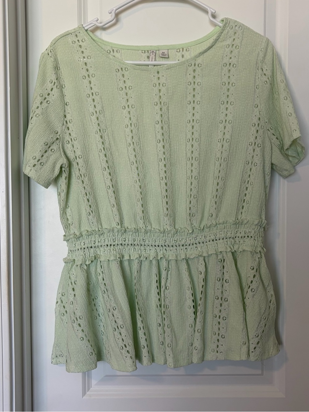 Est. 1946 Smocked Waist Eyelet Peplum Tunic in Light Green
Size M